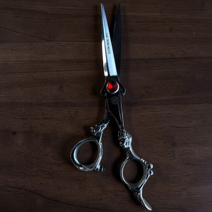 The Trim Mate Dragon Series professional scissors set with Japanese steel, featuring sharp, hand-sharpened thinning and cutting scissors.