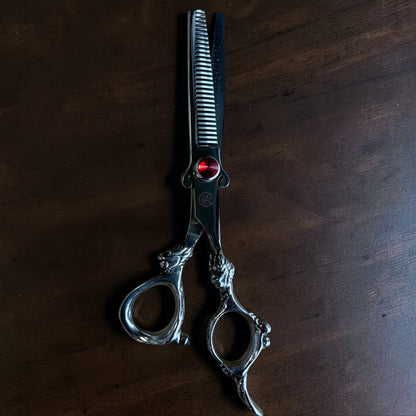 The Trim Mate Dragon Series professional scissors set with hand-sharpened Japanese steel, featuring three high-precision cutting scissors.